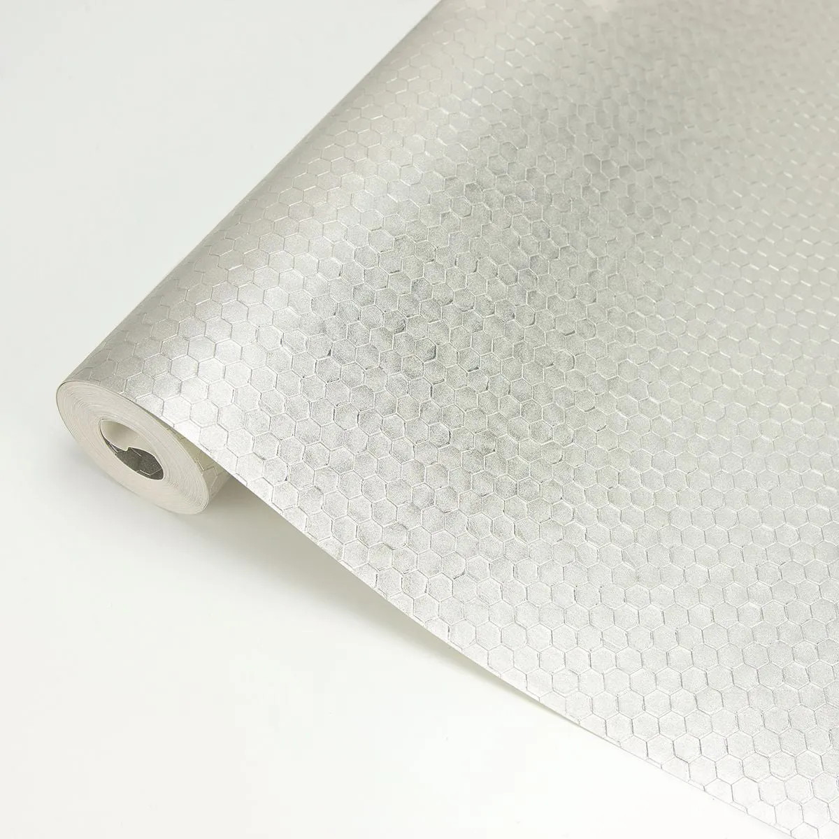 Carbon Honeycomb Geometric Wallpaper in Platinum from the Polished Collection